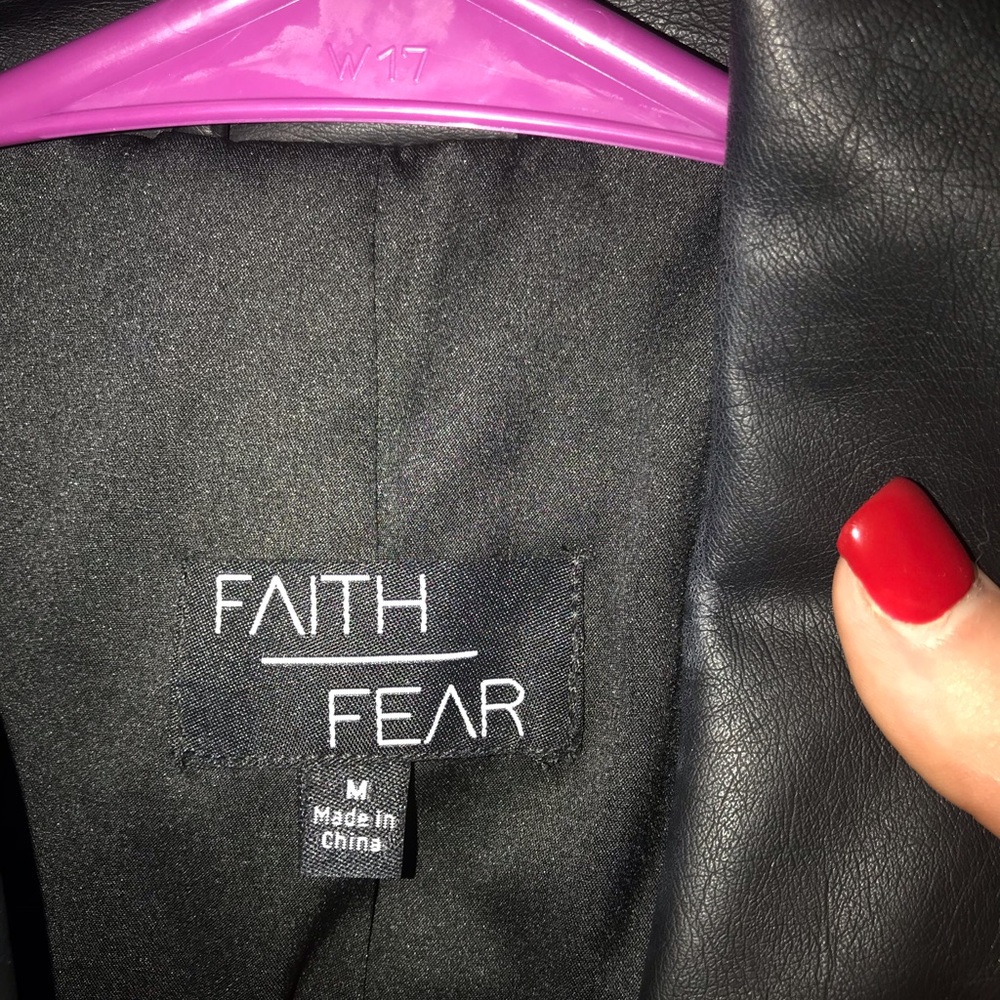 Faith over Fear black leather jacket.